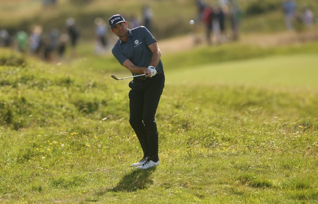 Jul 19, 2025; Portrush, IRL; Keegan Bradley chips on the 10th hole during the third round of The 153rd Open Championship golf tournament. Mandatory Credit: Mike Frey-Imagn Images/File Photo