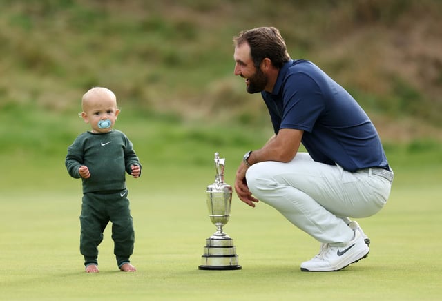 Scottie Scheffler celebrates with his son Bennett.