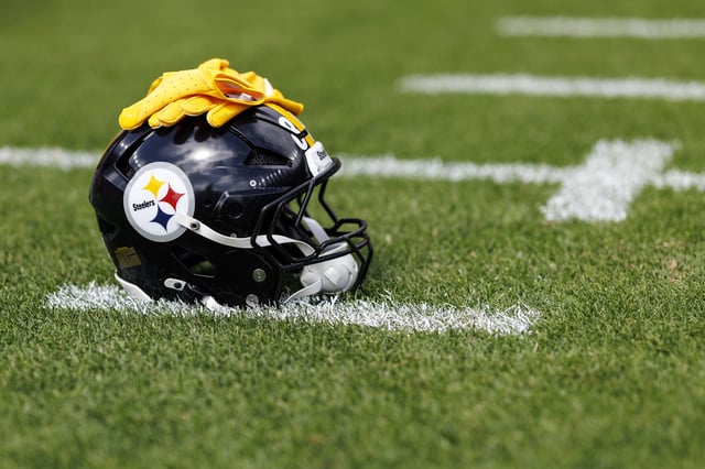A detail view of a Pittsburgh Steelers helmet on the field prior to an NFL football game against the Denver Broncos, at Empower Field at Mile High on September 15, 2024 in Denver, Colorado.