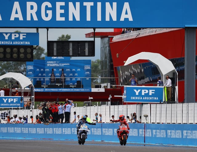 MotoGP - Argentina Grand Prix - Autodromo Termas de Rio Hondo, Santiago del Estero, Argentina - March 16, 2025 Ducati Lenovo Team's Marc Marquez celebrates winning the race with second place BK8 Gresini Racing MotoGP's Alex Marquez REUTERS/Agustin Marcarian/File Photo