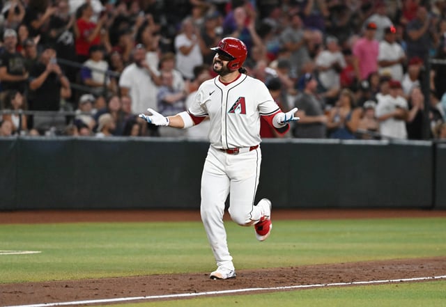 PHOENIX, ARIZONA - JULY 20: Eugenio Suarez #28 of the Arizona Diamondbacks celebrates after hitting a solo home run against the St. Louis Cardinals during the third inning at Chase Field on July 20, 2025 in Phoenix, Arizona.