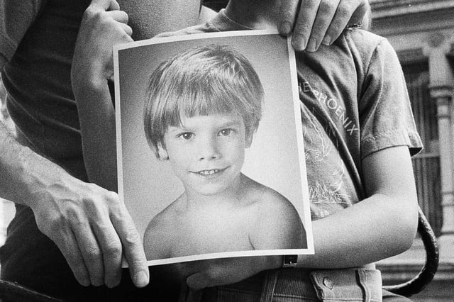 Stanly Patz with a photo of his son Etan.