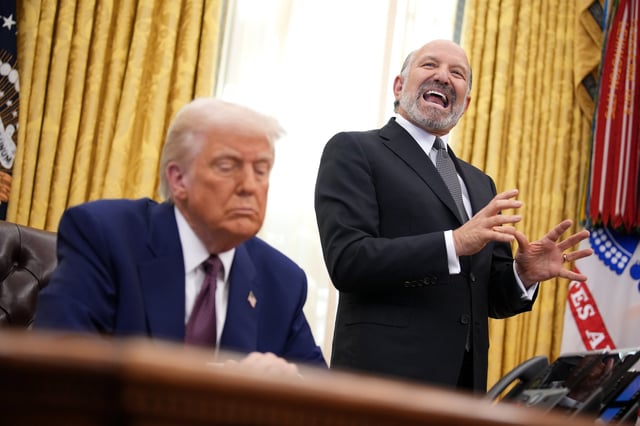 Secretary of Commerce Howard Lutnick speaks alongside President Donald Trump after Trump signed an executive order on &#34;reciprocal&#34; tariffs in the Oval Office at the White House on Feb. 13.