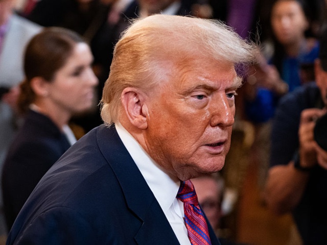 WASHINGTON, DC - JULY 18: President Donald Trump exits after signing the GENIUS Act at the White House in Washington, DC, on July 18, 2025. (Photo by Allison Robbert/For The Washington Post via Getty Images)