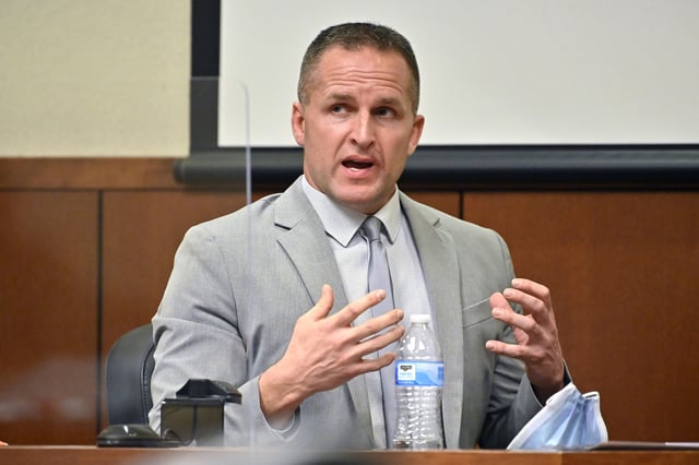 FILE - Former Louisville Police Officer Brett Hankison is questioned by his defense attorney, March 2, 2022, in Louisville, Ky.