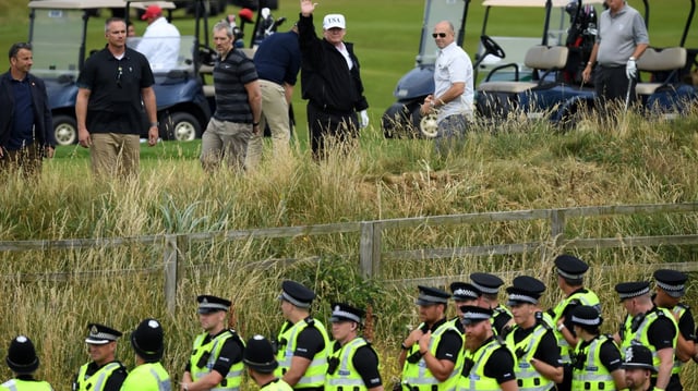 Police secure the area as President Trump plays golf at Turnberry in 2018