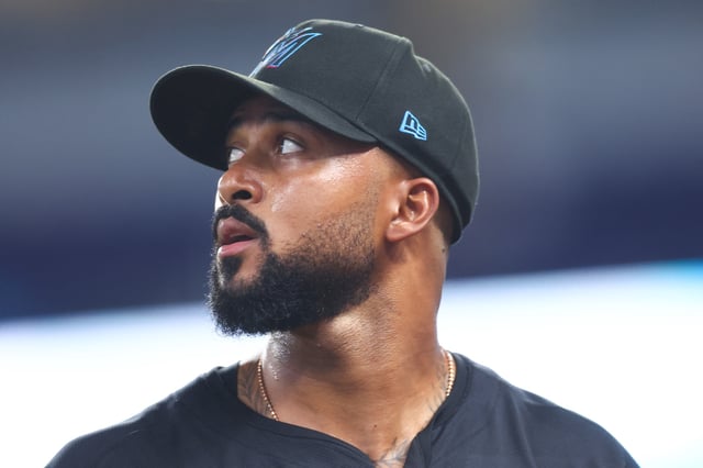 MIAMI, FLORIDA - JULY 18: Sandy Alcantara #22 of the Miami Marlins looks on against the Kansas City Royals in the first inning of the game at loanDepot park on July 18, 2025 in Miami, Florida.