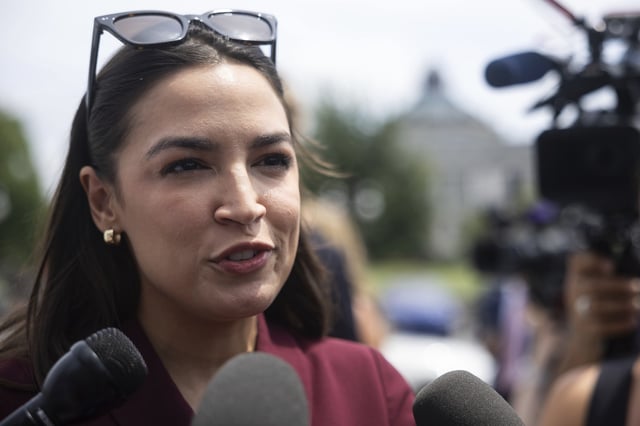 Rep. Alexandria Ocasio-Cortez (D-N.Y.) speaks with reporters as she arrives for a vote at the U.S. Capitol July 16, 2025.