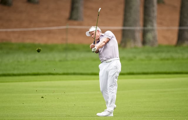 May 16, 2025; Charlotte, North Carolina, USA; Luke Donald hits his second shot on the second hole during the second round of the PGA Championship golf tournament at Quail Hollow. Mandatory Credit: Jim Dedmon-Imagn Images/File Photo