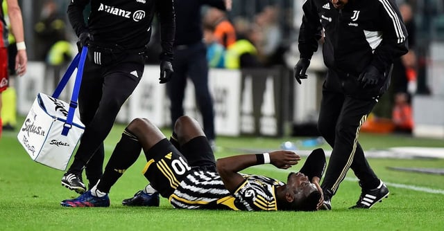 Soccer Football - Serie A - Juventus v Cremonese - Allianz Stadium, Turin, Italy - May 14, 2023 Juventus' Paul Pogba down after sustaining an injury REUTERS/Massimo Pinca