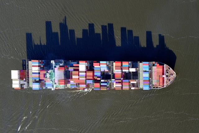 Container ship on the Elbe River in Hamburg, Germany. Credit: Holger Weitzel / Alamy Stock Photo