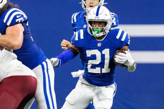Oct 30, 2022; Indianapolis, Indiana, USA; Indianapolis Colts running back Nyheim Hines (21) runs the ball in the second quarter against the Washington Commanders at Lucas Oil Stadium. Mandatory Credit: Trevor Ruszkowski-USA TODAY Sports/File Photo