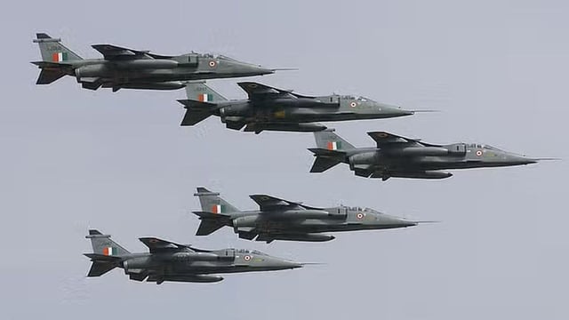Five SEPECAT Jaguar aircraft of the Indian Air Force in an arrowhead formation fly over the Yehlanka Airforce Base. File image/AFP
