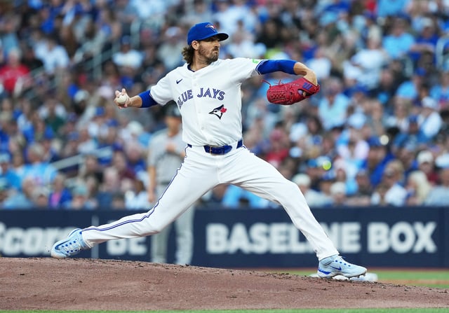 Jul 21, 2025; Toronto, Ontario, CAN; Toronto Blue Jays pitcher Kevin Gausman (34) throws a pitch against the New York Yankees during the second inning at Rogers Centre. Mandatory Credit: Nick Turchiaro-Imagn Images