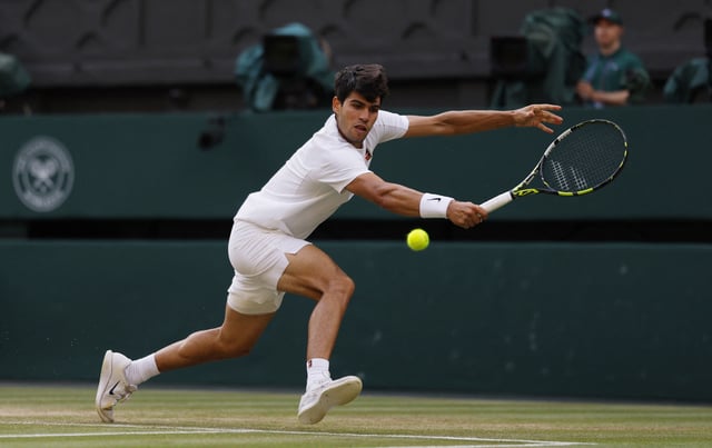 Tennis - Wimbledon - All England Lawn Tennis and Croquet Club, London, Britain - July 13, 2025 Spain's Carlos Alcaraz in action during his men's singles final against Italy's Jannik Sinner REUTERS/Andrew Couldridge/File Photo