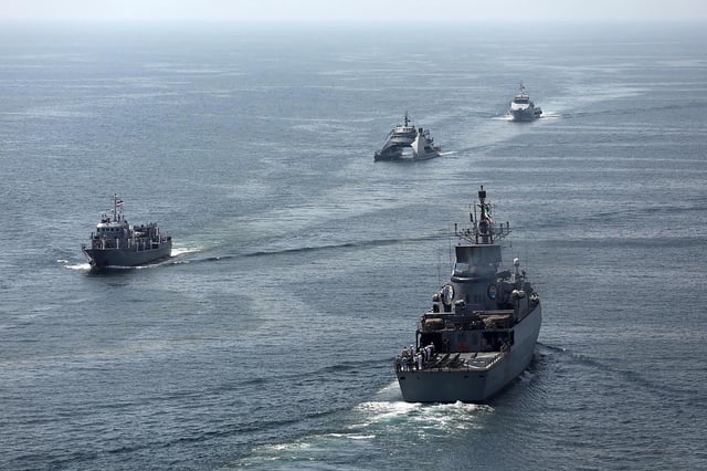 This handout photo made available by the Iranian Army Office on March 12, 2025 shows navy vessels taking part in a joint Iranian-Russian-Chinese military drill in the Gulf of Oman.