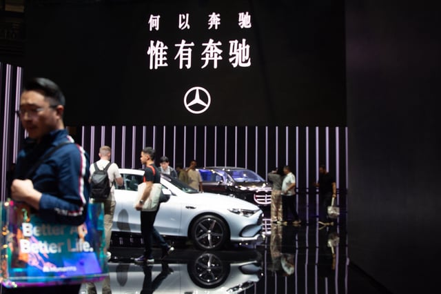 The Mercedes-Benz booth is at the National Exhibition Center in Shanghai, China, on April 25, 2025, during the first day of public viewing of the Shanghai International Automobile Show. (Photo by Ying Tang/NurPhoto via Getty Images)
