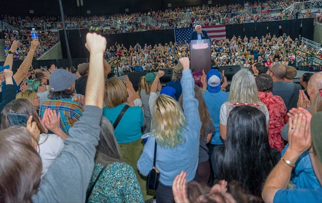 Senator Bernie Sanders (I-VT) speaks to a full auditorium as part of the “Fighting Oligarchy” tour on April 14, 2025, in Nampa, Idaho. According to event organizers, 12,500 people attended the rally.