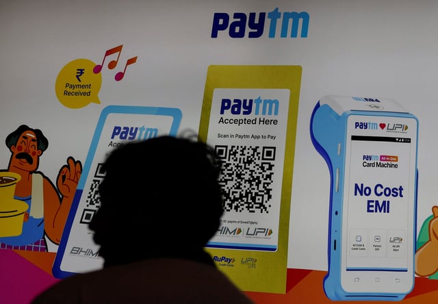 A man stands at the Paytm stall during the Global Fintech Fest in Mumbai, India, August 29, 2024. REUTERS/Francis Mascarenhas/File photo