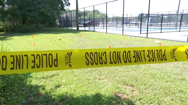 Police tape seals an area of a Brookhaven town park, in Suffolk County, N.Y., after a "fight club" was broken up on July 20. 2025.