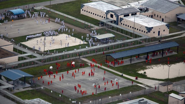 At a Miami immigration detention center, migrants were held in cells for hours without lunch and remained shackled while eating around 7 p.m.