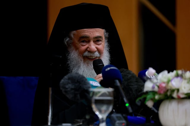 Greek Orthodox Patriarch of Jerusalem Theophilos III attends a press conference after a trip to Gaza where he visited a church shelled by Israel, in Jerusalem, July 22, 2025. REUTERS/Ammar Awad