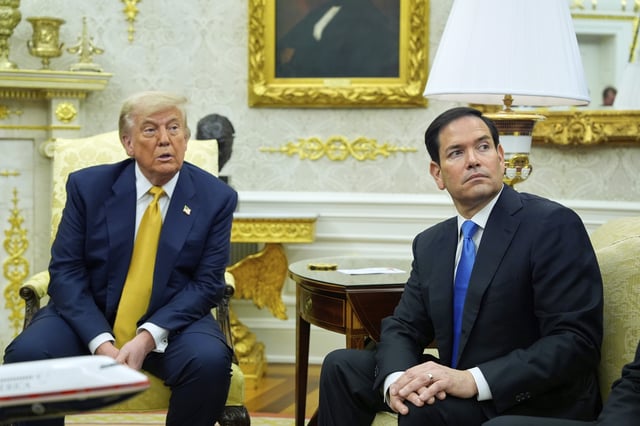 President Donald Trump and Secretary of State Marco Rubio listen during a meeting with Bahrain&#39;s Crown Prince Salman bin Hamad Al Khalifa in the Oval Office of the White House, Wednesday, July 16, 2025, in Washington.