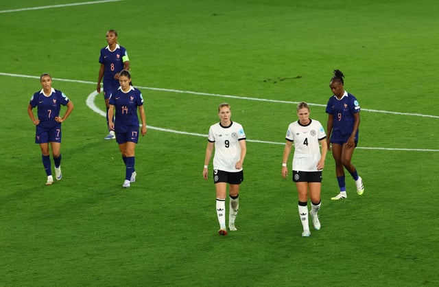 Soccer Football - UEFA Women's Euro 2025 - Quarter Final - France v Germany - St. Jakob-Park, Basel, Switzerland - July 19, 2025  Germany's Sjoeke Nusken and Rebecca Knaak at the end of normal time REUTERS/Bernadett Szabo/File Photo