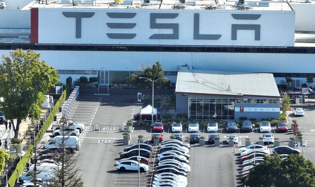 The exterior of the Tesla automotive company manufacturing facility on September 18, 2023 in Fremont, California.