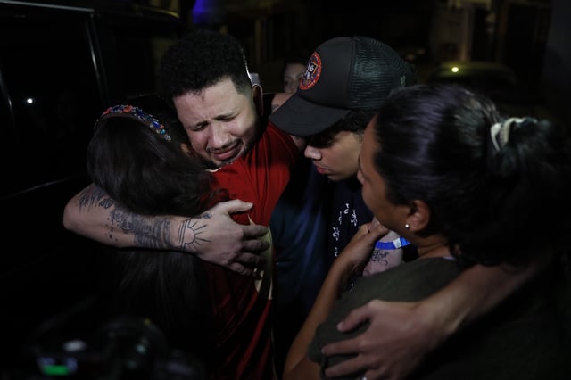 Arturo Suárez, one of the Venezuelan migrants deported months ago to El Salvador by the United States under the Trump administration&#39;s immigration crackdown, is welcomed home by his relatives in Caracas, Venezuela, Tuesday, July 22, 2025.