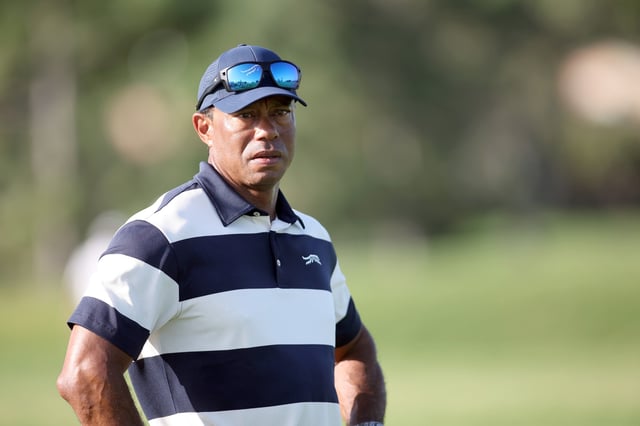 Tiger Woods watches his son Charlie Woods play during the first round of the U.S. Junior Amateur at Brook Hollow Golf Club on July 21, 2025 in Dallas, Texas.