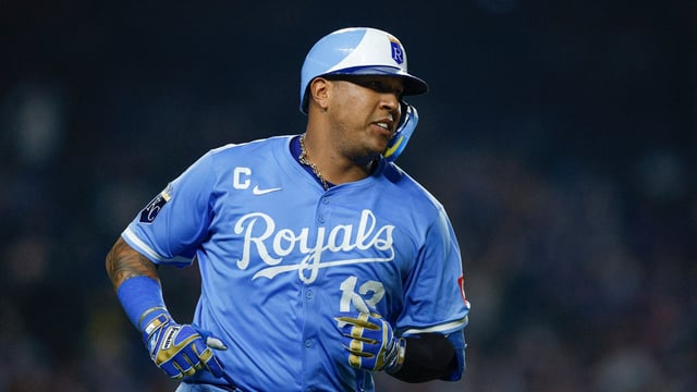  Kansas City Royals catcher Salvador Perez (13) rounds the bases after hitting a two-run home run against the Chicago Cubs during the eight inning at Wrigley Field.