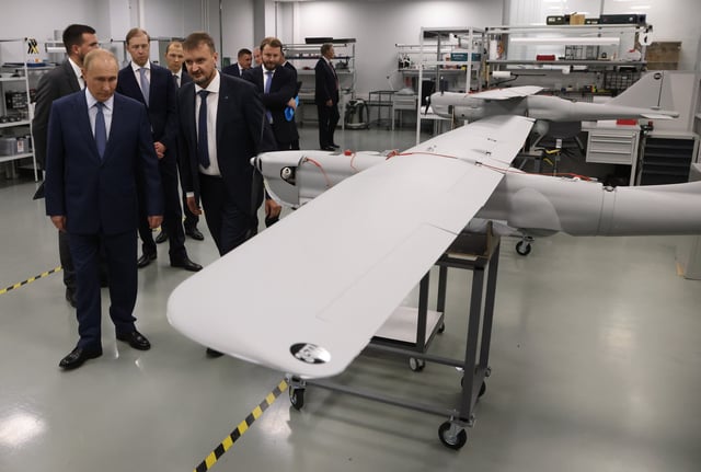 This image from September 19, 2024 shows Vladimir Putinand his officials at an exhibition of Orlan-10 UAV drones at the Special Technology Center in Saint Petersburg.