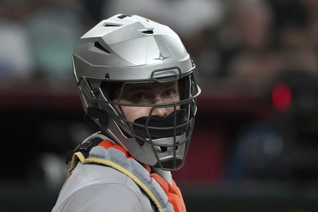 San Francisco Giants catcher Patrick Bailey (14) against the Arizona Diamondbacks in the seventh inning during a baseball game, Monday, June 30, 2025, in Phoenix. (AP Photo/Rick Scuteri)