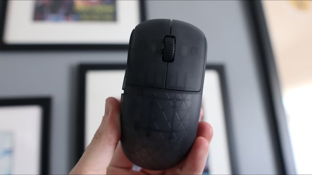 An Endgame Gear OP1w 4K gaming mouse on a desk.
