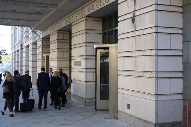 AP's members leave the U.S. District Court, on the day a judge hears arguments in the Associated Press' (AP) bid to restore access for its journalists to cover press events aboard Air Force One and at the White House, after the Trump administration barred the news agency for continuing to refer to the Gulf of Mexico in its coverage, in Washington, D.C., U.S., March 27, 2025. REUTERS/Tom Brenner/File Photo