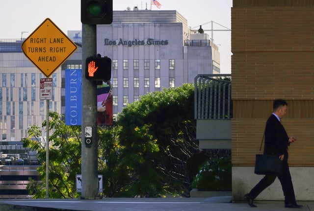FILE - The Los Angeles Times building is seen in downtown Los Angeles on Feb. 7, 2018. (AP Photo/Richard Vogel, file)