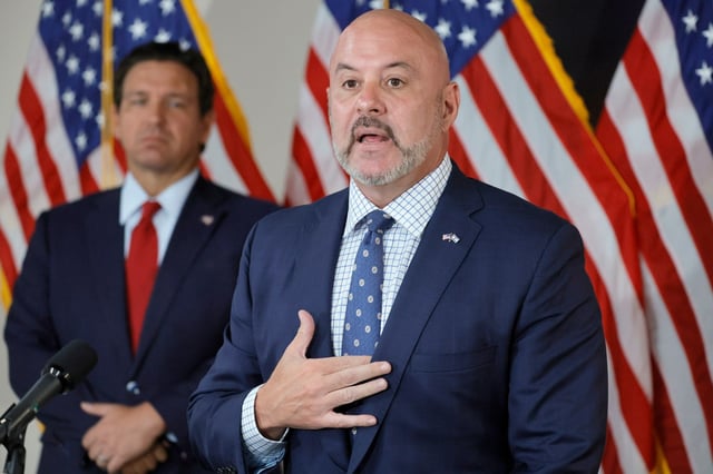 Florida Chief Financial Officer Blaise Ingoglia speaks as Governor Ron DeSantis looks on during a news conference announcing an audit of Broward County’s spending. This at the FDOT District 4 office in Fort Lauderdale on Tuesday, July 22, 2025. (Amy Beth Bennett / South Florida Sun Sentinel)