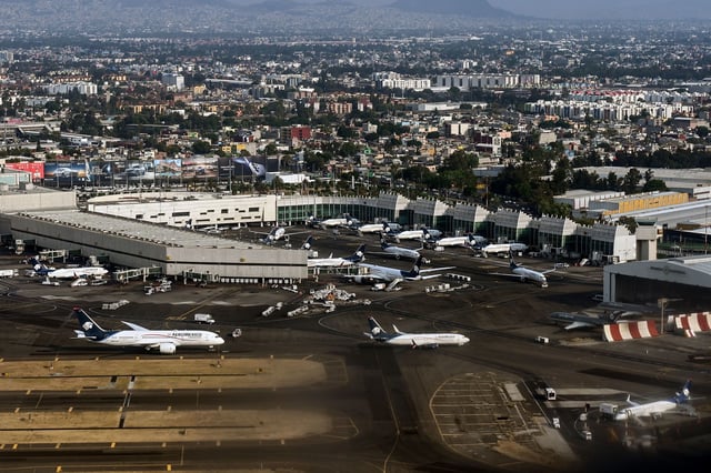 Planes of Mexican airline Aeromexico taxi at Benito Juarez International Airport in Mexico City on May 3, 2025. On July 19, 2025, the US Department of Transportation accused Mexican authorities of engaging in anti-competitive practices by rescinding flight slots from US airlines and forcing them to move their cargo operations to a terminal outside Mexico City. (Photo by Yuri CORTEZ / AFP) (Photo by YURI CORTEZ/AFP via Getty Images)          