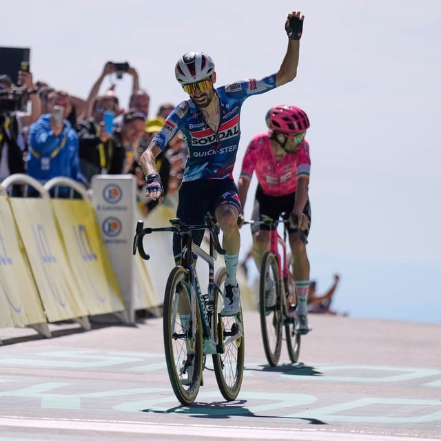 France's Valentin Paret Peintre crosses the finish line ahead of Ireland's Ben Healy to win the sixteenth stage of the Tour de France cycling race over 171.5 kilometers (106.6 miles) with start in Montpellier and finish on the Mont Ventoux, France, Tuesday, July 22, 2025. (AP Photo/Mosa'ab Elshamy)