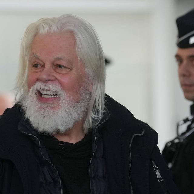FILE - Environmental activist Paul Watson smiles as he arrives at Charles de Gaulle's airport in Roissy, north of Paris, Dec. 20, 2025 after being released from prison few days ago. (AP Photo/Thibault Camus, file)