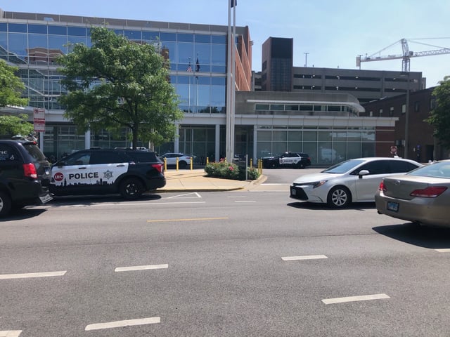 Police cars parked outside UI Health’s OCC Clinic on Tuesday, July 22. 
