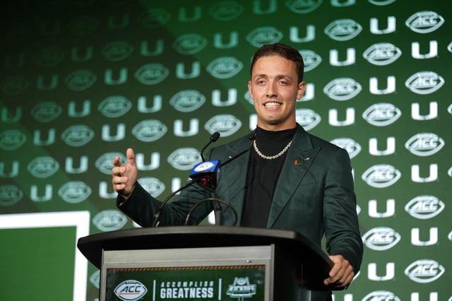 Jul 22, 2025; Charlotte, NC, USA; Miami quarterback Carson Beck answers questions from the media during ACC Media Days at Hilton Charlotte Uptown. Mandatory Credit: Jim Dedmon-Imagn Images
