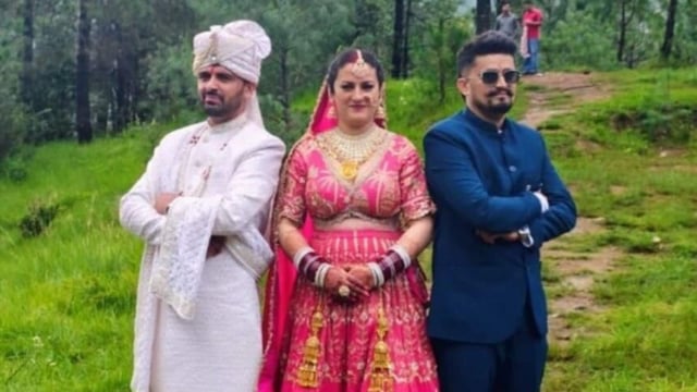 A video from the ceremony also went viral on social media, showing one of the grooms holding his hand out for the bride to welcome her on stage.