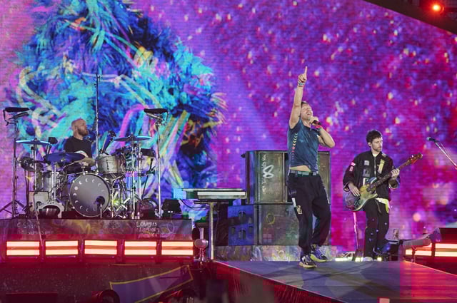 Will Champion, Chris Martin, and Guy Berryman of Coldplay perform at Rogers Stadium on July 07, 2025 in Toronto, Ontario. (Photo by Robert Okine/Getty Images)