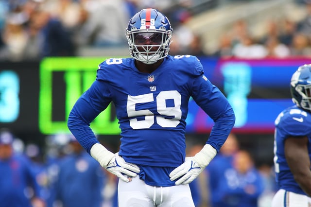 Lorenzo Carter #59 of the New York Giants in action against the Carolina Panthers at MetLife Stadium on October 24, 2021 in East Rutherford, New Jersey. New York Giants defeated the Carolina Panthers 25-3.