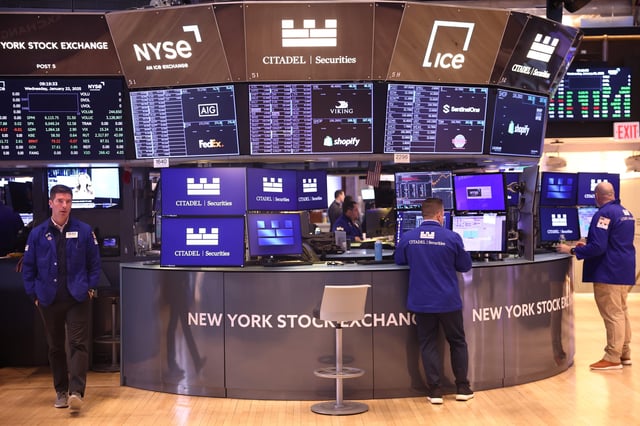 NEW YORK, NEW YORK - JANUARY 22: Traders work on the floor of the New York Stock Exchange during morning trading on January 22, 2025 in New York City. Stocks continued an upward swing opening up high a day after the Dow Jones closed up 500 points and the S&P 500 approaching an all-time high. The rise comes after OpenAI CEO Sam Altman, SoftBank CEO Masayoshi Son and Oracle Chairman Larry Ellison made an announcement alongside President Donald Trump that they will create a new company, called Stargate, to grow artificial intelligence infrastructure in the U.S. (Photo by Michael M. Santiago/Getty Images)