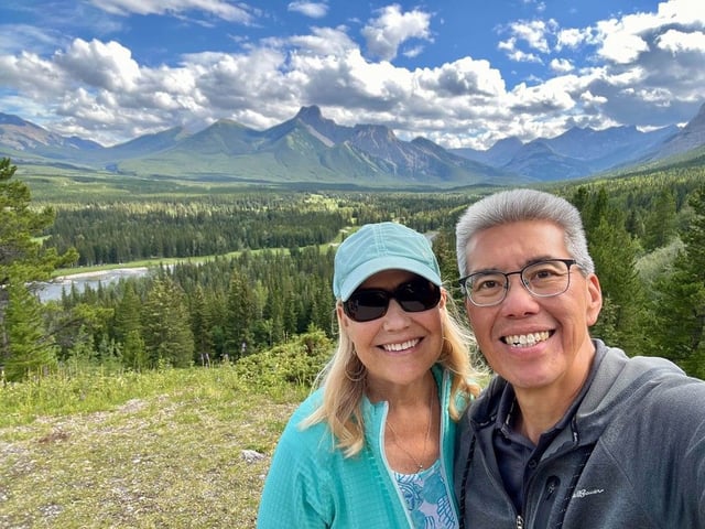 Howard Mah and Lori Arnason are shown in a recent supplied photo. The couple were recently pursued by a grizzly bear on a popular Kananaskis trail, west of Calgary. Supplied