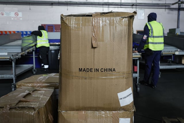This photo shows an air freight parcel marked 'Made in China' in a warehouse at Roissy-Charles de Gaulle airport, outside Paris, on December 20, 2024.