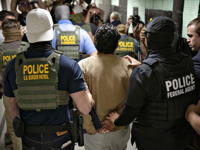 NEW YORK, UNITED STATES - JULY 01: Federal agents detain a person after attending a court hearing at immigration court at the Jacob K. Javitz Federal Building in New York City, New York, U.S., July 1, 2025. (Photo by Mostafa Bassim/Anadolu via Getty Images)